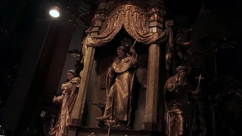 A statue in one of the Prague church interior Stock Footage 73401691