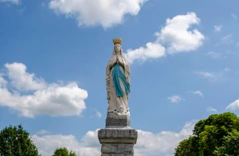 Statue of Our Lady of Immaculate Conception. Lourdes, France, major place of Stock Photos