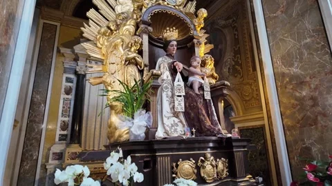 Statue of Our Lady of Mount Carmel inside a historic church Stock Footage 337412614