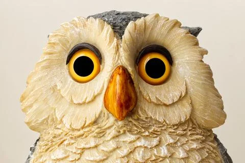 Statue of an Owl isolated on bright background. Close up. Stock-Fotos