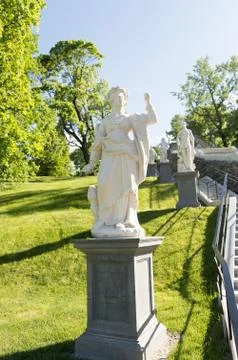A statue in Peterhof park dragon cascade in the summer Stock Photos