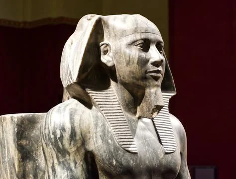 Statue of Pharaoh Khafre enthroned. Stock Photos