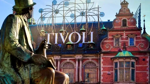 Statue of poet H C Andersen in front of the Tivoli Garden, Copenhagen Stock Footage 143927522