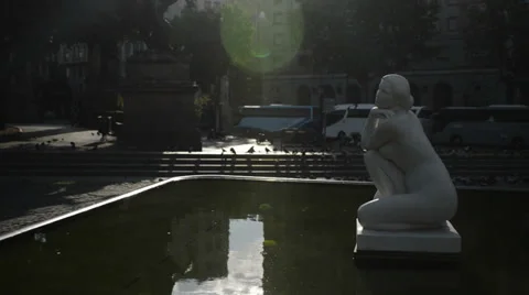 Statue in pool and lens flare in Plaza Catalunia Barcelona HD Stock Footage 39901848