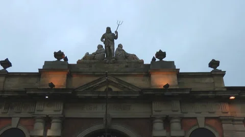 Statue of Poseidon standing between two fish market women Old Fish Market, Stock Footage 1101831