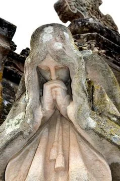 Statue praying Stock Photos