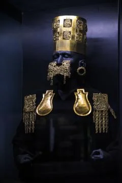 Statue presenting ancient Peruvian Lord wearing gold ornaments Stock Photos