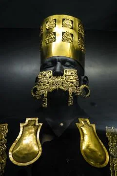 Statue presenting ancient Peruvian Lord wearing gold ornaments Stock Photos