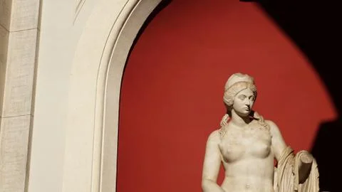 Statue red background Stock Photos