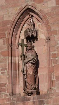 Statue of saint with cross Stock-Fotos