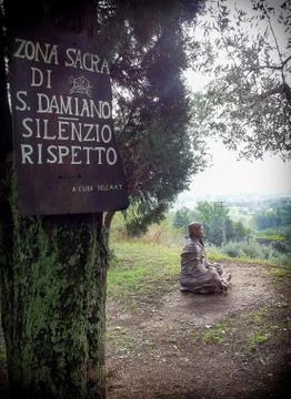 Statue of Saint Francis looking to the view Stock Photos