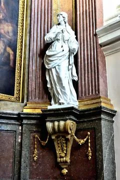 Statue of a saint in the gothic cathedral of saint peter and paul in Brno. Stock Photos