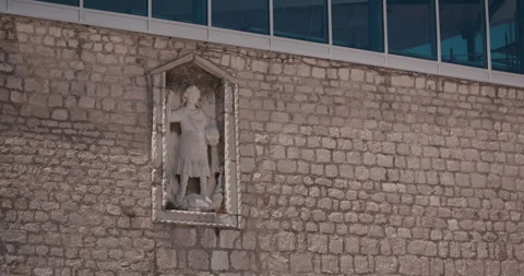 Statue of Saint Michael on a Stone Wall in Sibenik Stock Footage 336928273