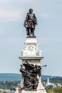 Statue of Samuel de Champlain against blue summer sky in historic area founde Stock Photos