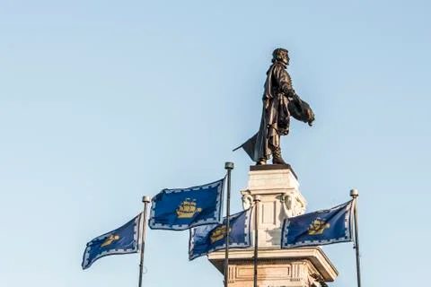 Statue of Samuel de Champlain against blue summer sky in historic area founde Stock Photos