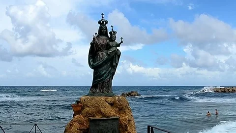 Statue of Santa Maria a Mare on the seafront of S.Maria di Castellabate Stock Footage 74395891