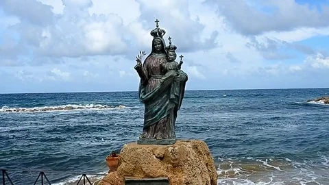 Statue of Santa Maria a Mare on the seafront of S.Maria di Castellabate Stock Footage 74395922
