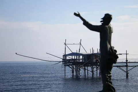 Statue on the sea with overflow background Stock Photos
