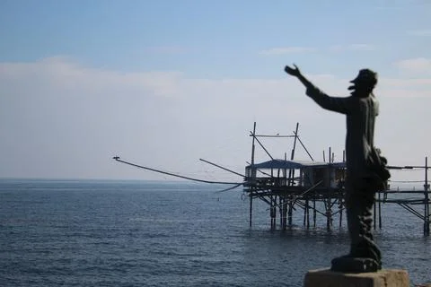 Statue on the sea with overflow background Stock Photos