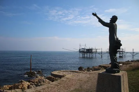 Statue on the sea with overflow background Stock Photos