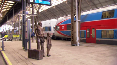 Statue of Sir Nicholas Winton, Platform, Praha hlavni nadrazi railway station Stock Footage 130288635