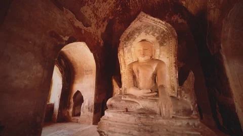 Statue of sitting Buddha inside an untitled simple temple in Bagan Myanmar Stock Footage 135885056