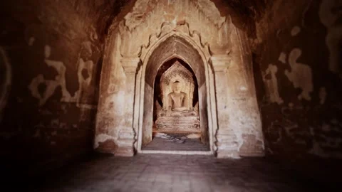Statue of sitting Buddha inside an untitled simple temple in Bagan Myanmar Stock Footage 141047347