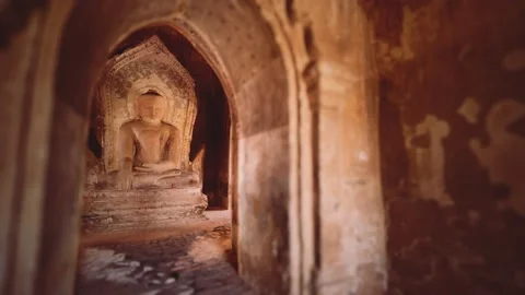 Statue of sitting Buddha inside an untitled simple temple in Bagan Myanmar Stockbeeldmateriaal 143893614