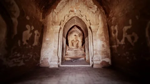 Statue of sitting Buddha inside an untitled simple temple in Bagan Myanmar Stock-Footage 150429608