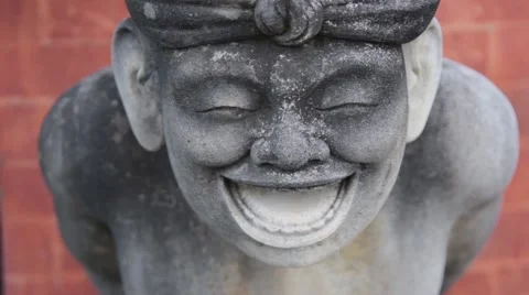 Statue of a Smiling Man Stock Footage 67532975