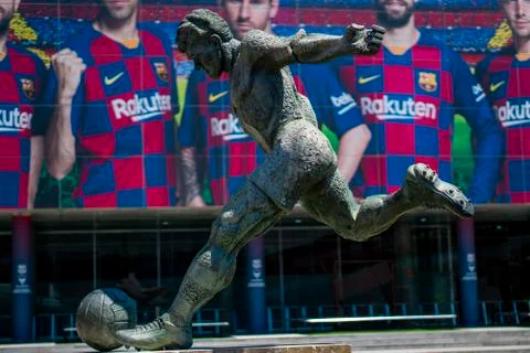 A statue of soccer player Stock Photos