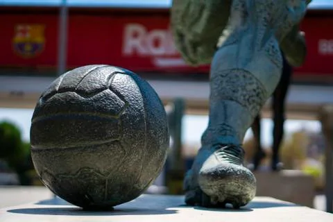 A statue of soccer player Stock Photos