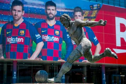A statue of soccer player Stock Photos