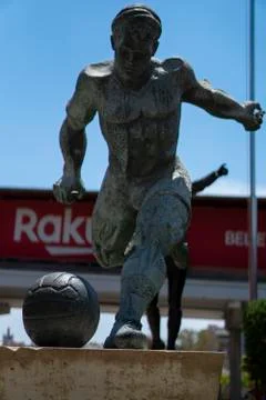 A statue of soccer player Stock Photos