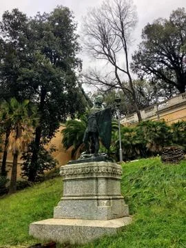 A statue with sword and the shield in Terrazza del Pincio near by the Piazza del Stock Photos