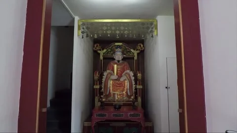 Statue on the Throne at Altar inside Buddha Tooth Relic Temple, Singapore Stock Footage 328475922