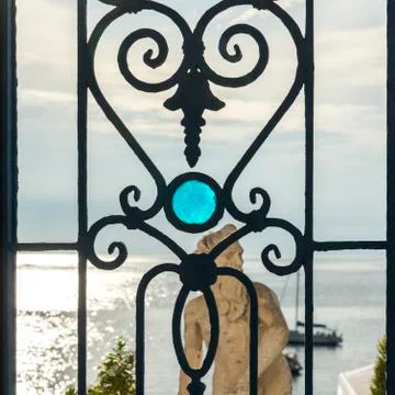 Statue through a window at waterfront, Sant'Angelo, Ischia Island, Campania, 스톡 사진