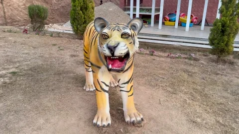 Statue of tiger in the zoo Stock Footage 327384632