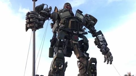 Statue of a transformer robot against the sky Video stock 146936268