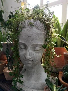 The statue of a tree-haired man For decorating the garden to look beautiful Stock Photos