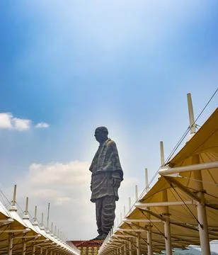 Statue of unity with bright dramatic sky at day from different angle 写真素材