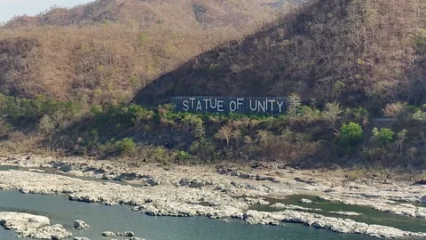 Statue of Unity Sign on Dry Narmada Riverbed Exposed Rocks Gujarat India — Stock Footage 335432740