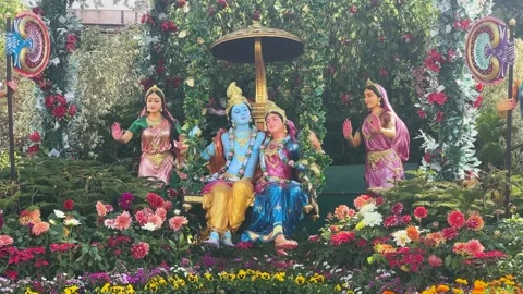 Statue Visualization Of Radha Krishna On Swing With Gopis Dancing In Braj Stock Footage 329361244