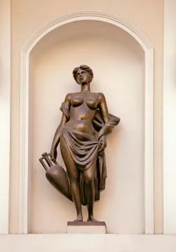 Statue in a wall niche in Riga Stock Photos