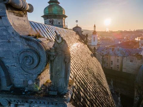 Statue without a head on top of the Bernardine church in Lviv. Stock Photos