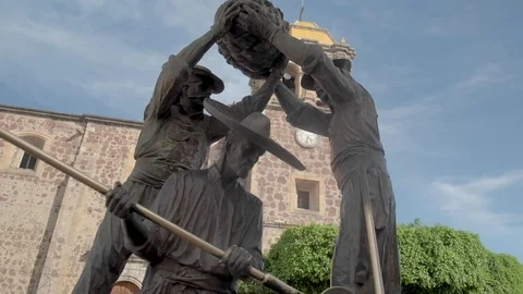 Statue Workers by Church Stock Footage 122717084