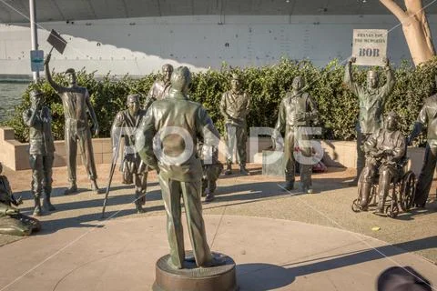 Statue of World War II Entertainer and Troops Stock Photos