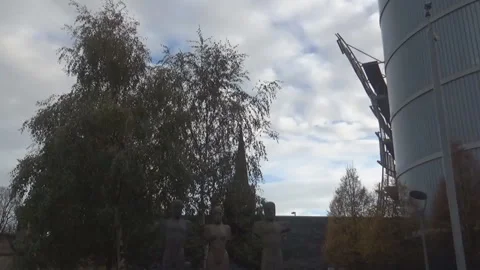 Statues and modern building Stock Footage 112359409