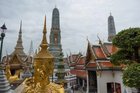 Statues and temples in the Grand palace of Bangkok, Thailand Stock Photos