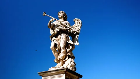 Statues of angels symbolizing passion located on the famous Angels' bridge Stock Footage 142992993